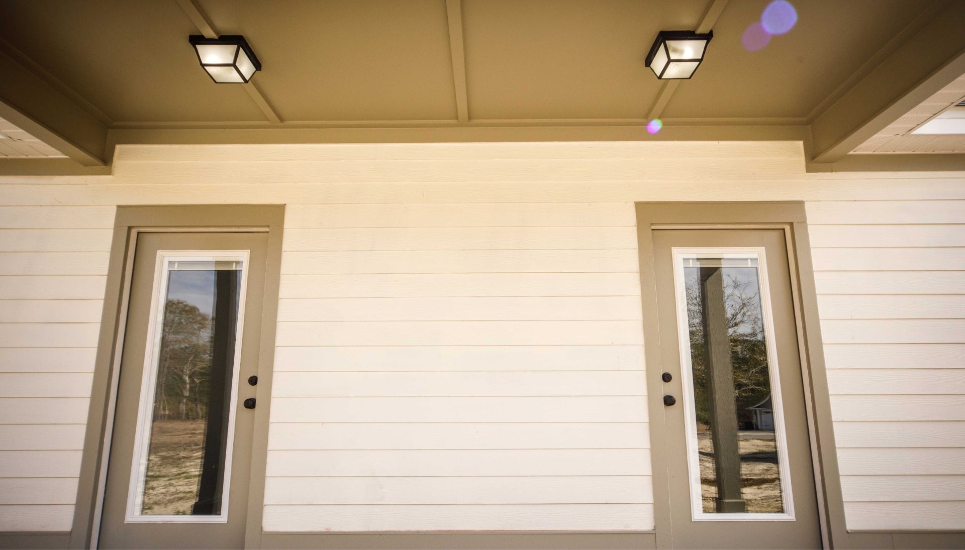 We offer siding services in Johnson City, Tennessee. Hardie plank siding installation in a front entry way.